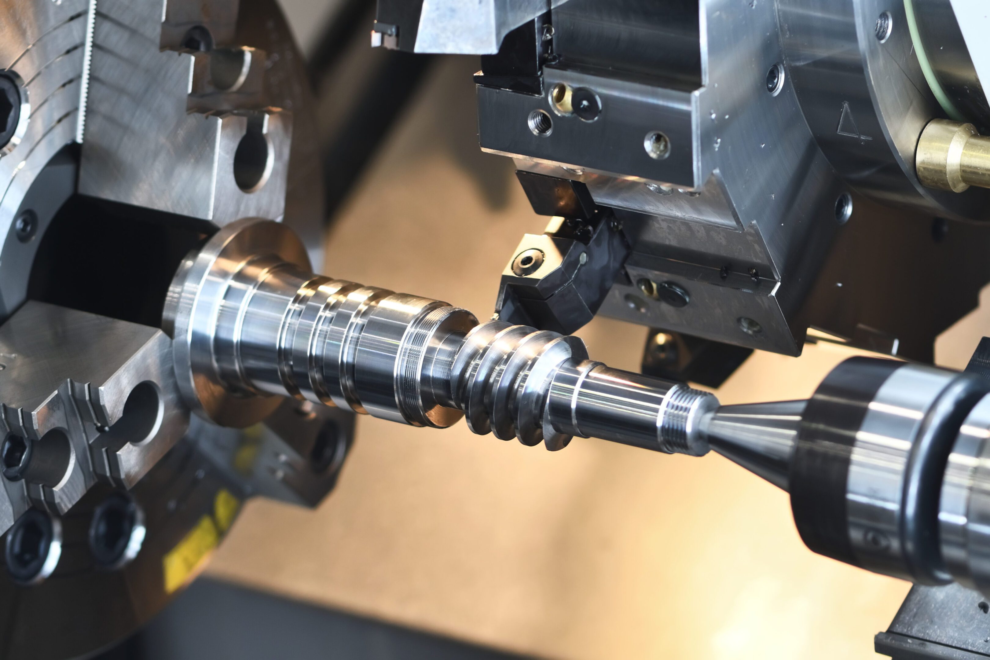 CNC machine cutting a metal workpiece.